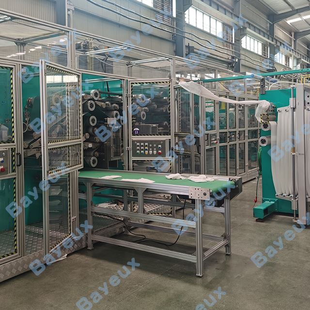 China Full Servo U Shape Baby Diaper Machine